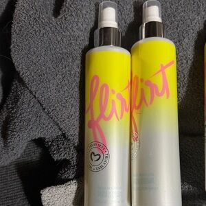 2 bottles of Flirt Body Dew Oil